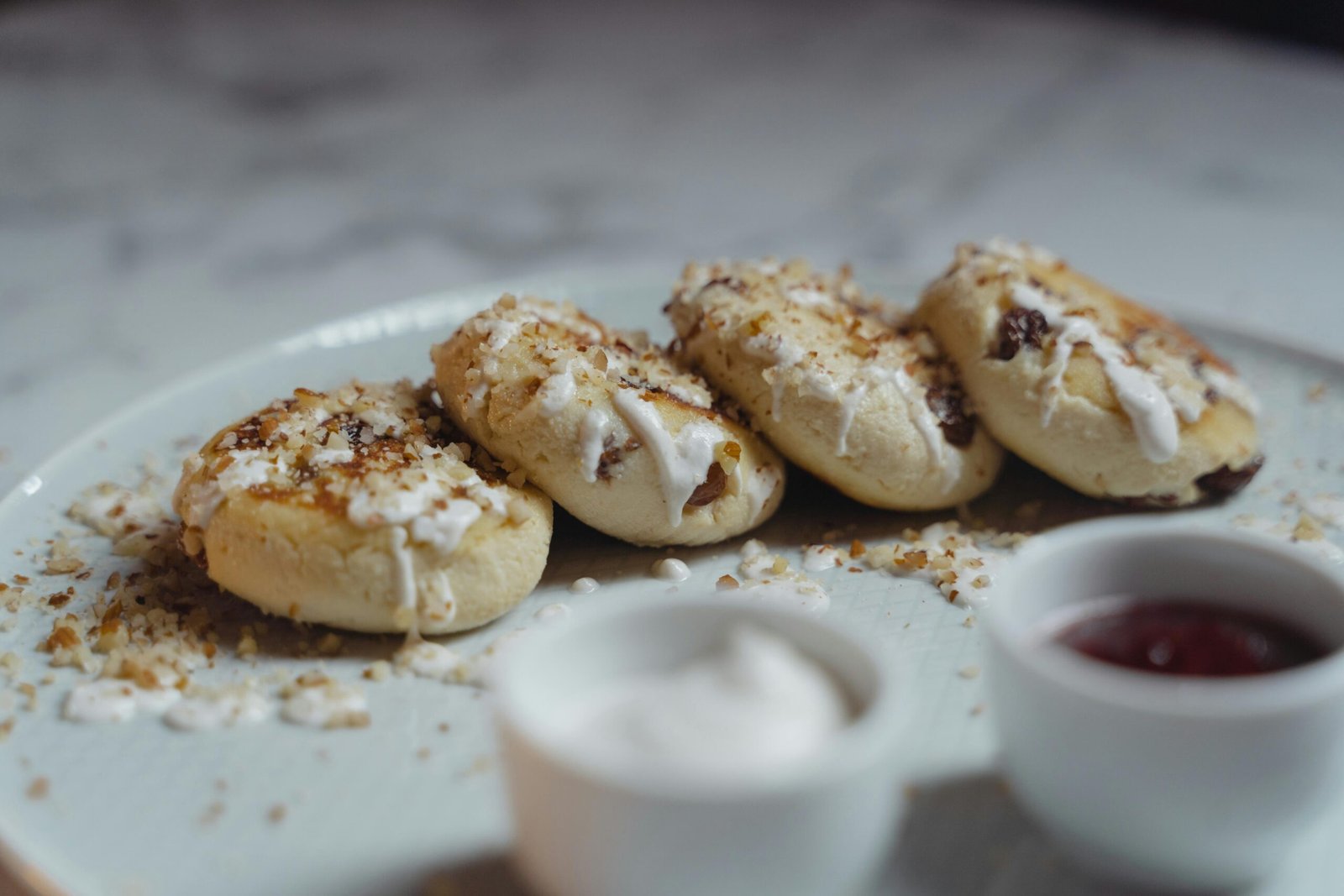 A healthy diet is essential for maintaining good physical and emotional health throughout your life. "A variety of healthy cookies and yogurt on a breakfast table for a balanced diet."